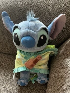 Disney Parks Exclusive Stitch baby in a blanket with Velcro closure